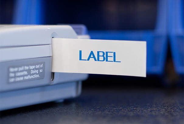 Label maker printing label for photo