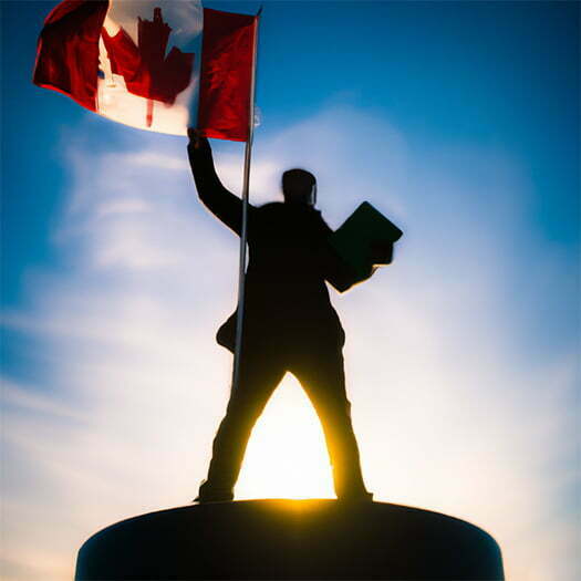 Silhouette of a person standing on a hill holding a laptop and a Canadian flag. Recognizing the importance of data sovereignty for Indigenous people across “Canada”.